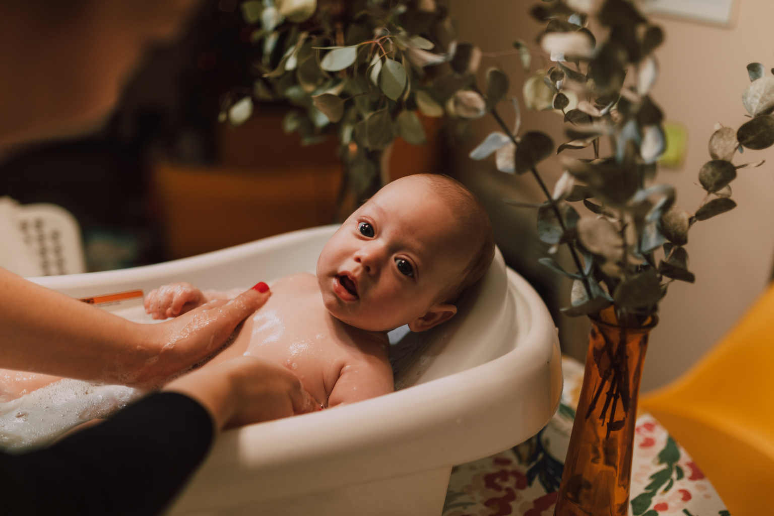 This photo illustrates how a warm bath can be part of calming activities before sleep, visually reinforcing the idea that bedtime routines soothe and prepare children for rest. It connects the keyword directly to a relatable, nurturing moment that parents can adopt.