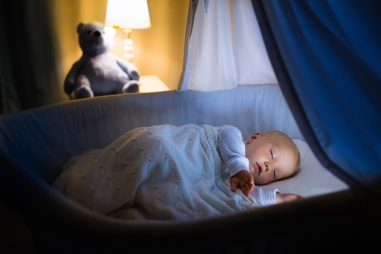 This photo demonstrates the result of screen-free bedtime alternatives, showing how a calm, tech-free environment supports deeper, more restful sleep for babies.