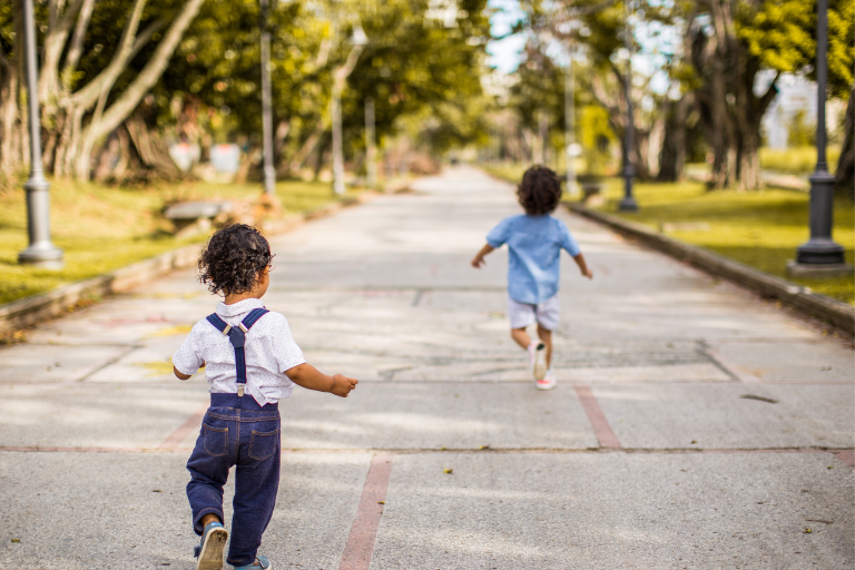 Toddler play and sleep supported by outdoor activity and physical games.