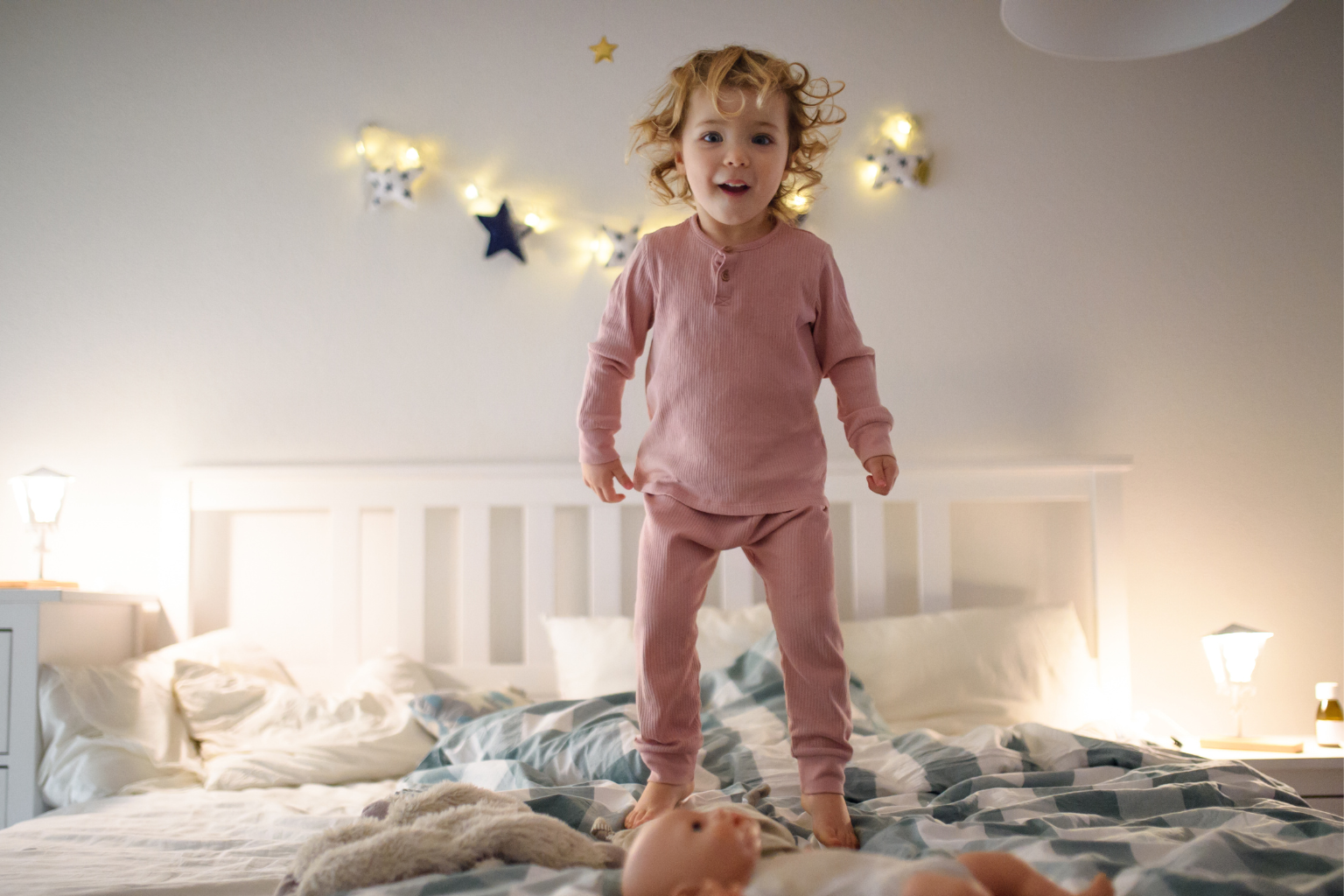 Peaceful bedtime environment with toddler bed, breathable cotton sheets, and nightlight.